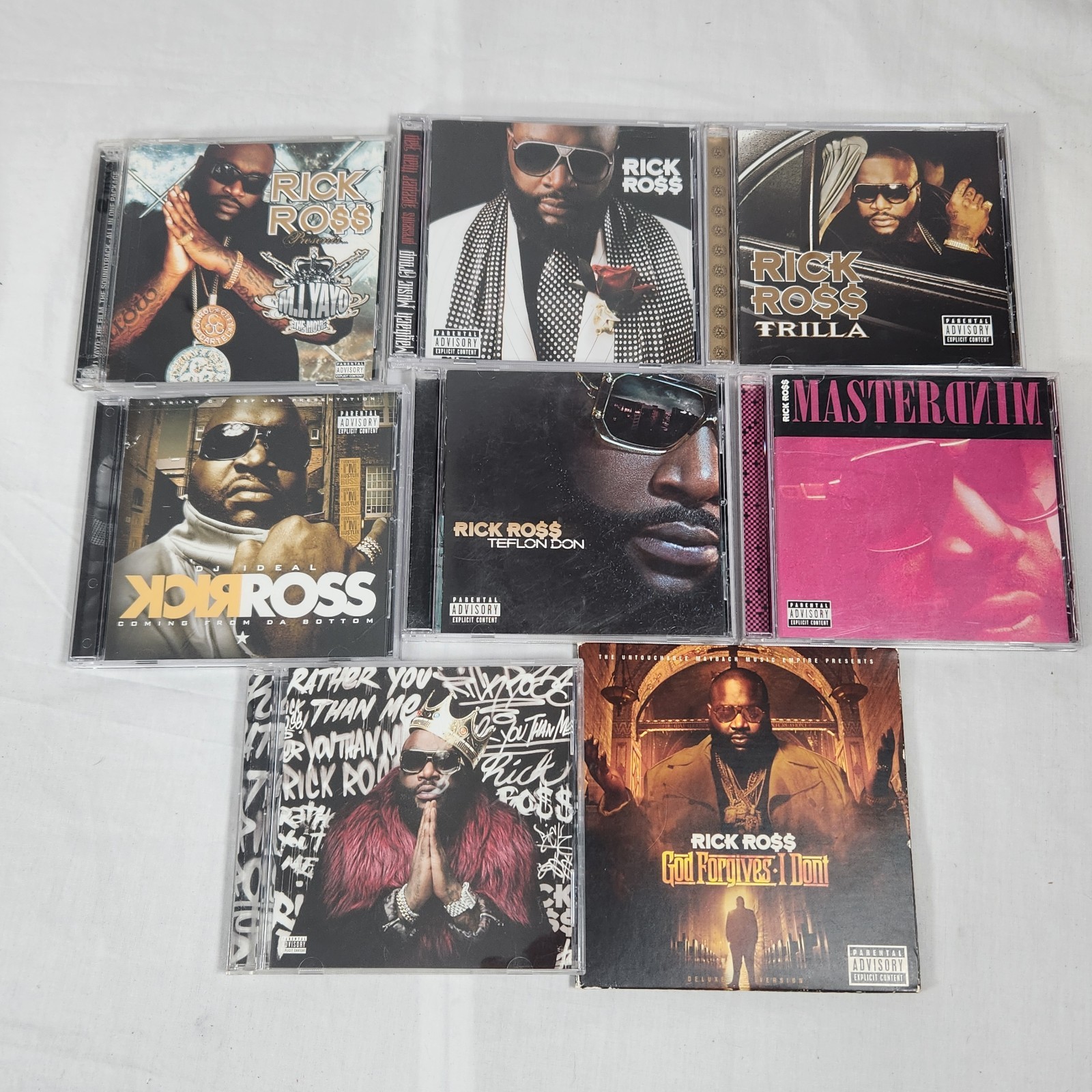 Mixed Lot Of 8 Rick Ross CDs In Cases