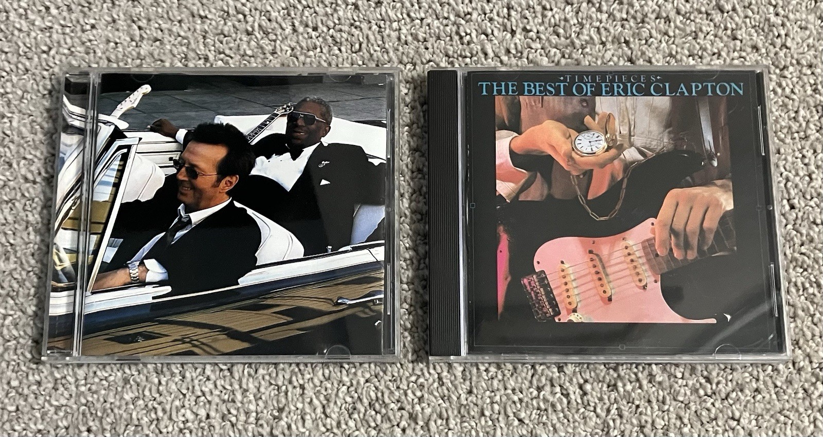 2 Eric Clapton CDS – Riding with The King & Timepieces