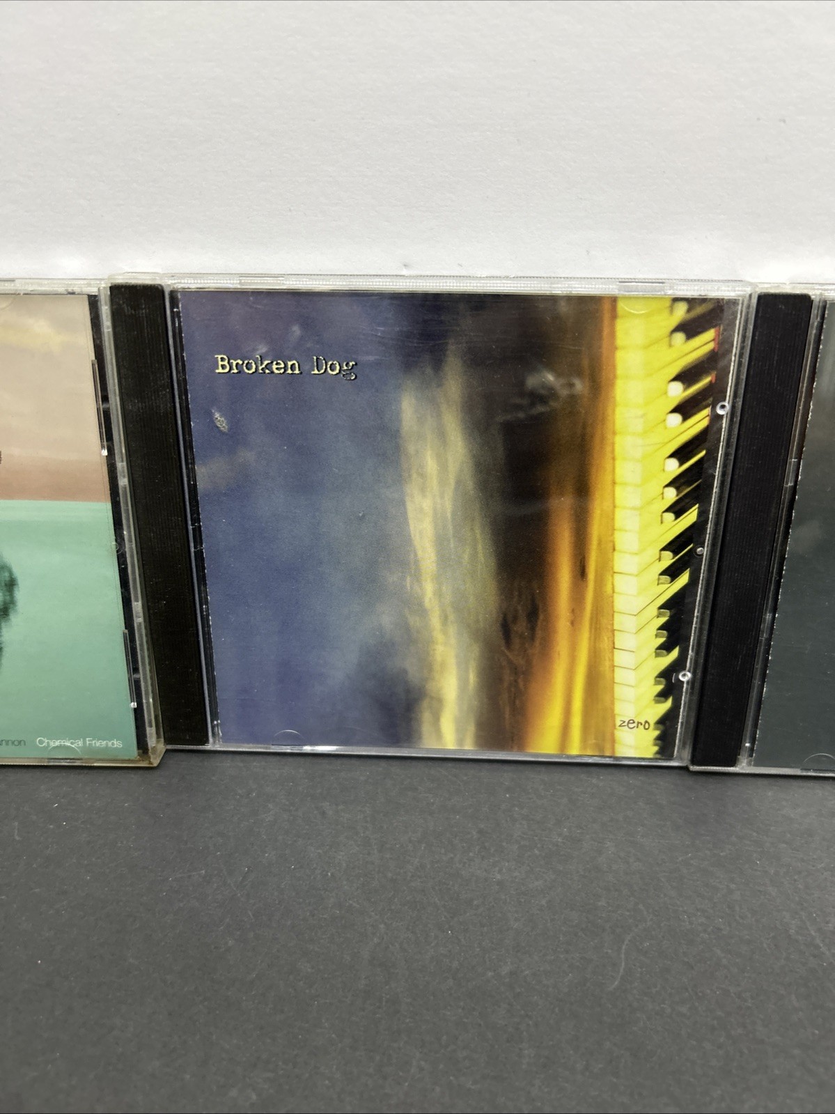 ELECTRONIC LOT OF 4 CD’S – THE RENTALS, BEDHEAD, BROKEN DOG & NYLES LANNON