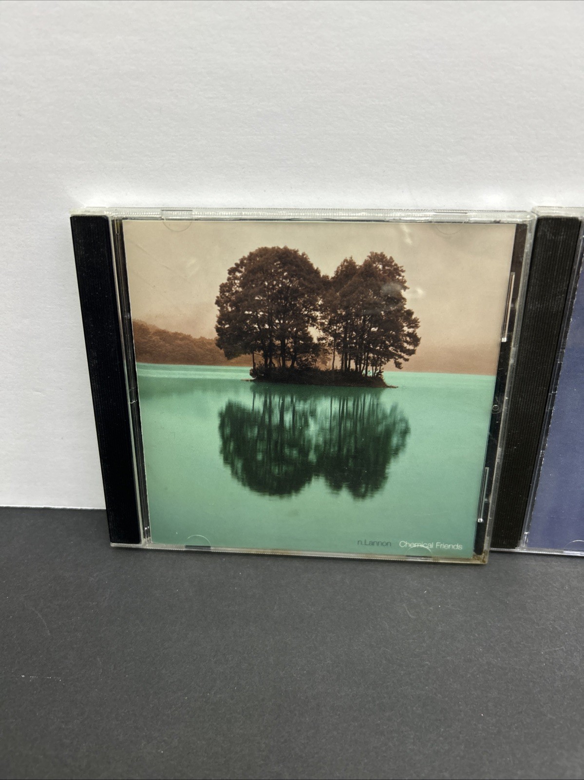 ELECTRONIC LOT OF 4 CD’S – THE RENTALS, BEDHEAD, BROKEN DOG & NYLES LANNON